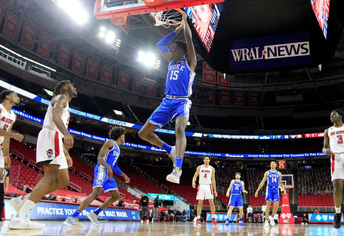 Duke’s Mark Williams (15) slams in two during Duke’s 69-53 victory over N.C. State at PNC Arena in Raleigh, N.C., Saturday, February 13, 2021.