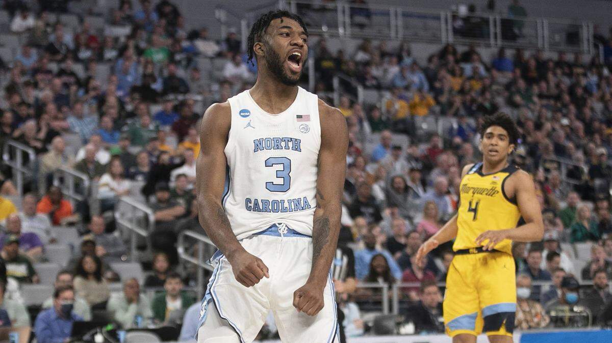 North Carolina’s Dontrez Styles (3) reacts after a dunk on Marquette’s Greg Elliott (5) in the second half on Thursday, March 17, 2022 during the NCAA Tournament at Dickies Arena in Ft. Worth, TX.