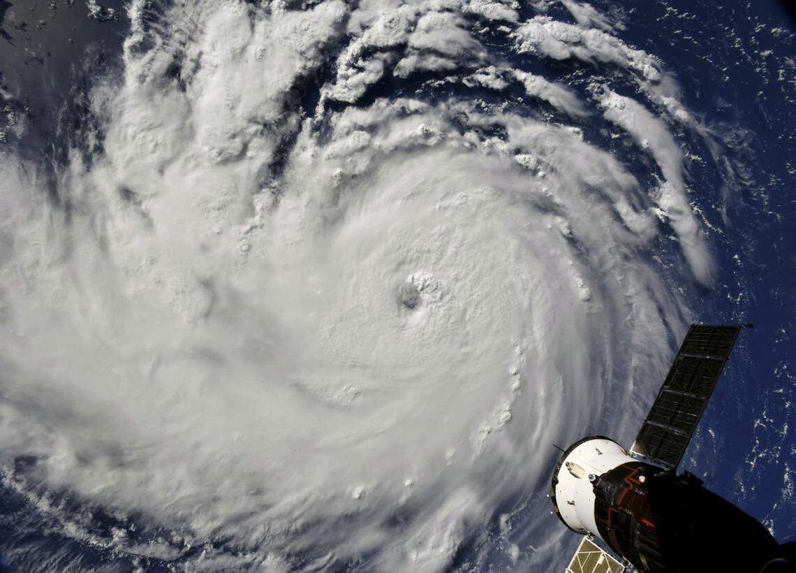 This photo provided by NASA shows Hurricane Florence from the International Space Station on Monday, Sept. 10, 2018, as it threatens the U.S. East Coast. Forecasters said Florence could become an extremely dangerous major hurricane sometime Monday and remain that way for days. (NASA via AP)