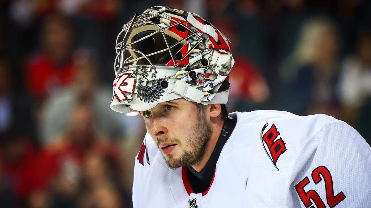 Oct 24, 2024; Calgary, Alberta, CAN; Carolina Hurricanes goaltender Pyotr Kochetkov (52) during the third period against the Calgary Flames at Scotiabank Saddledome. Mandatory Credit: Sergei Belski-Imagn Images