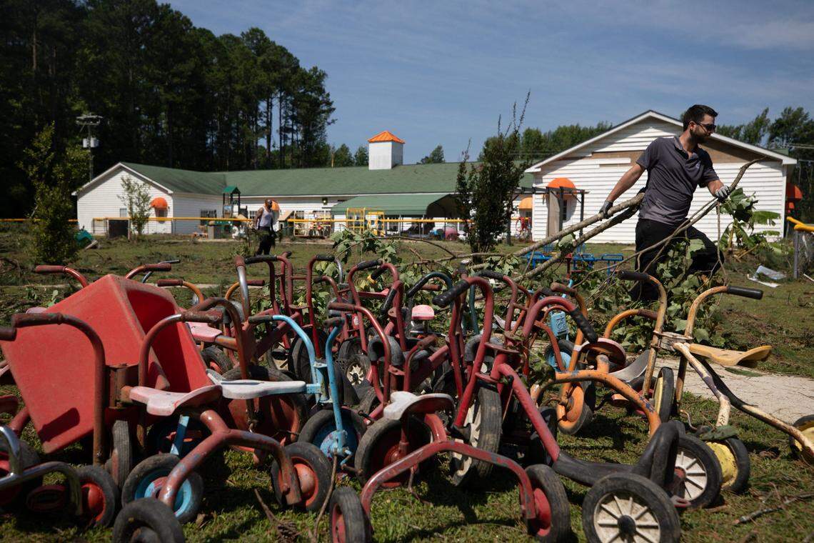 Volunteers help clean up tornado damage at St. Stephen Loving Daycare Center in Rocky Mount, N.C. on Thursday, July 20, 2023. The tornado swept through the area on Wednesday.