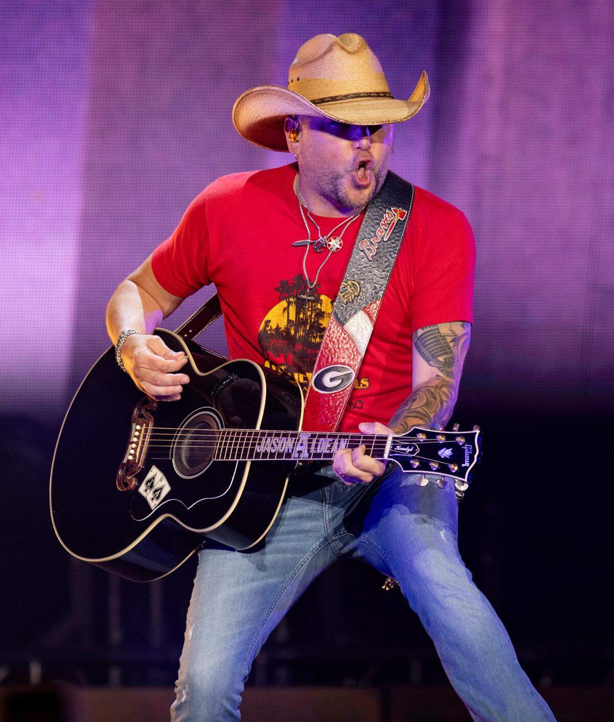 Jason Aldean belts out a song at Raleigh, N.C.’s Coastal Credit Union Music Park at Walnut Creek, Friday night, Aug. 11, 2023.
