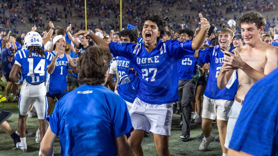 Duke fans storm the field to celebrate their 28-7 victory over Clemson on Monday, September 4, 2023 at Wallace Wade Stadium Stadium in Durham, N.C.