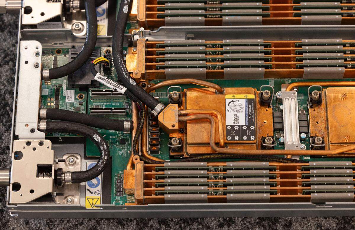 Looking inside one of Lenovo’s servers on Tuesday, Jan. 28, 2025, in Morrisville, N.C., copper surrounds the components that produce heat. Cold water is circulated around these components to keep them cool for the best computing efficiency.