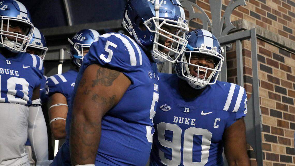 Duke’s DeWayne Carter (90) yells as he takes the field for pre-game warmups prior to the Blue Devils’ game against Notre Dame at Wallace Wade Stadium on Saturday, Sept. 30, 2023, in Durham, N.C.
