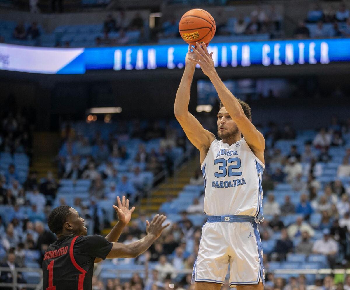 North Carolina’s Pete Nance (32) puts up a shot against Gardner-Webb’s Julian Soumaoro (1) during the first half on Tuesday, November 15, 2022 at the Smith Center in Chapel Hill, N.C. Nance scored 16 points in the first half.
