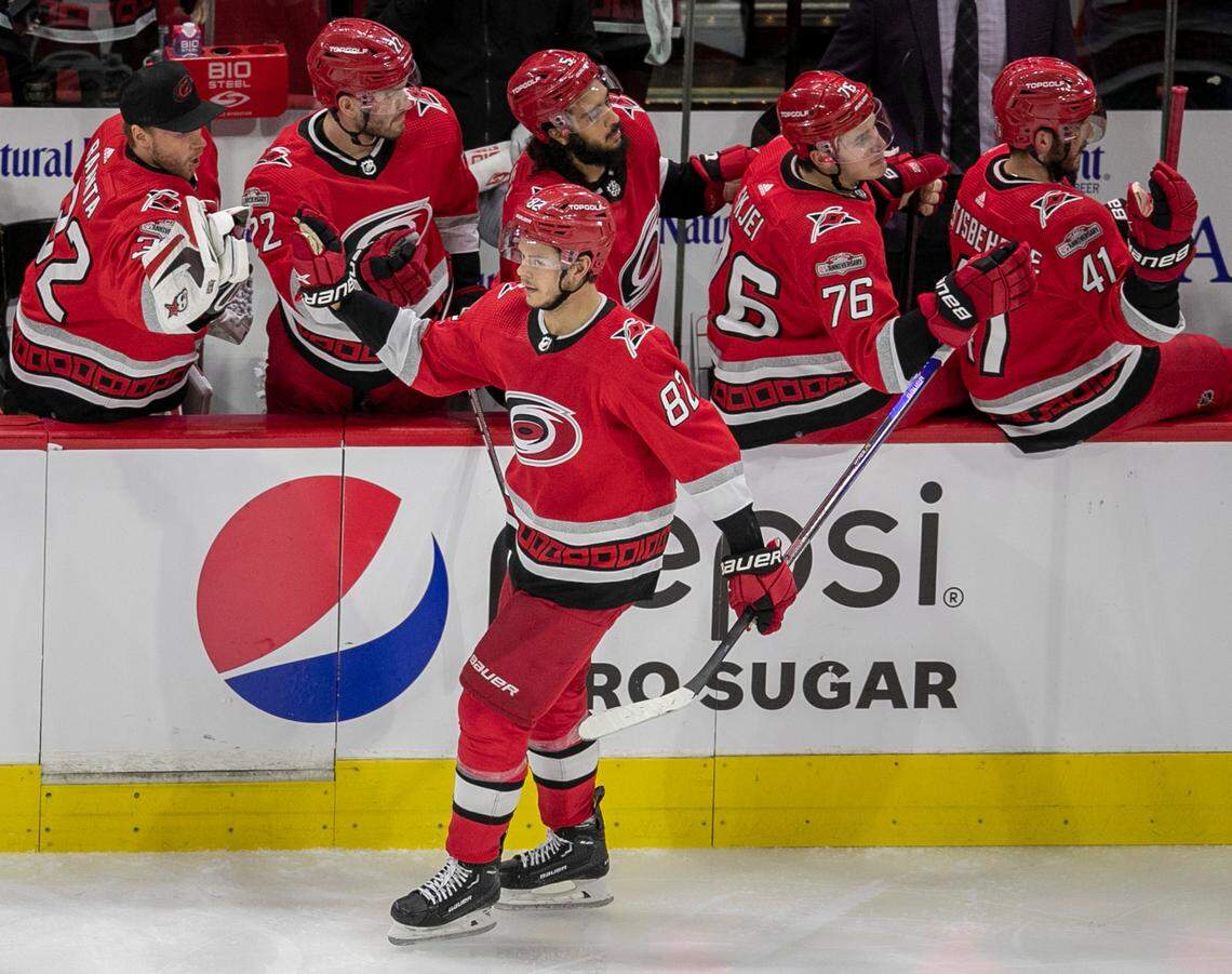 The Carolina Hurricanes Jesperi Kotkaniemi (82) skates to the bench after scoring in the second period to take 3-0 lead over the New Jersey Devils during Game 1 of their second round Stanley Cup playoff series on Wednesday, May 3, 2023 at PNC Arena in Raleigh, N.C.