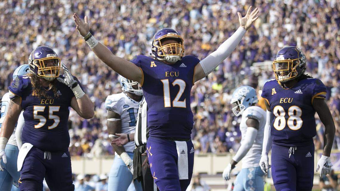 East Carolina quarterback Holton Ahlers (12) celebrates after scoring a touchdown in the second quarter against North Carolina in 2018 at Dowdy-Ficklen Stadium in Greenville. Ahlers wants to be the quarterback who’s remembered for bringing the Pirates back to glory.