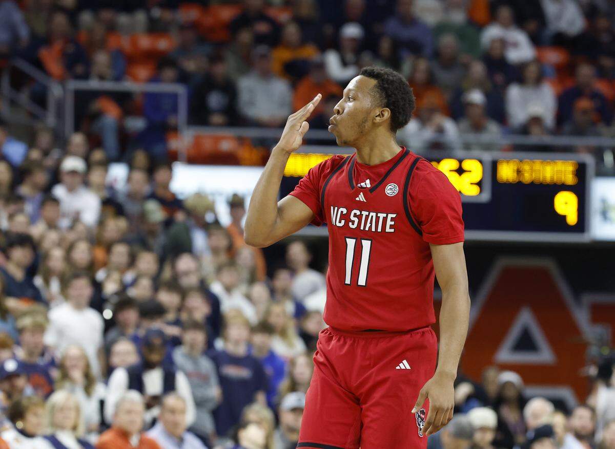 N.C. State’s Quadir Copeland blows a kiss to the crowd after scoring during the first half of the Wolfpack’s game against Auburn in the ACC/SEC Challenge on Wednesday, Dec. 3, 2025, at Neville Arena in Auburn, Ala. 