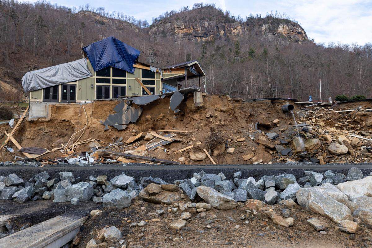 The Burntshirt Vineyards Tasting Room and Bistro, shown on Wednesday, December 18, 2024, suffered severe damage from Hurricane Helene flooding along the Rocky Broad River in Chimney Rock, N.C. 