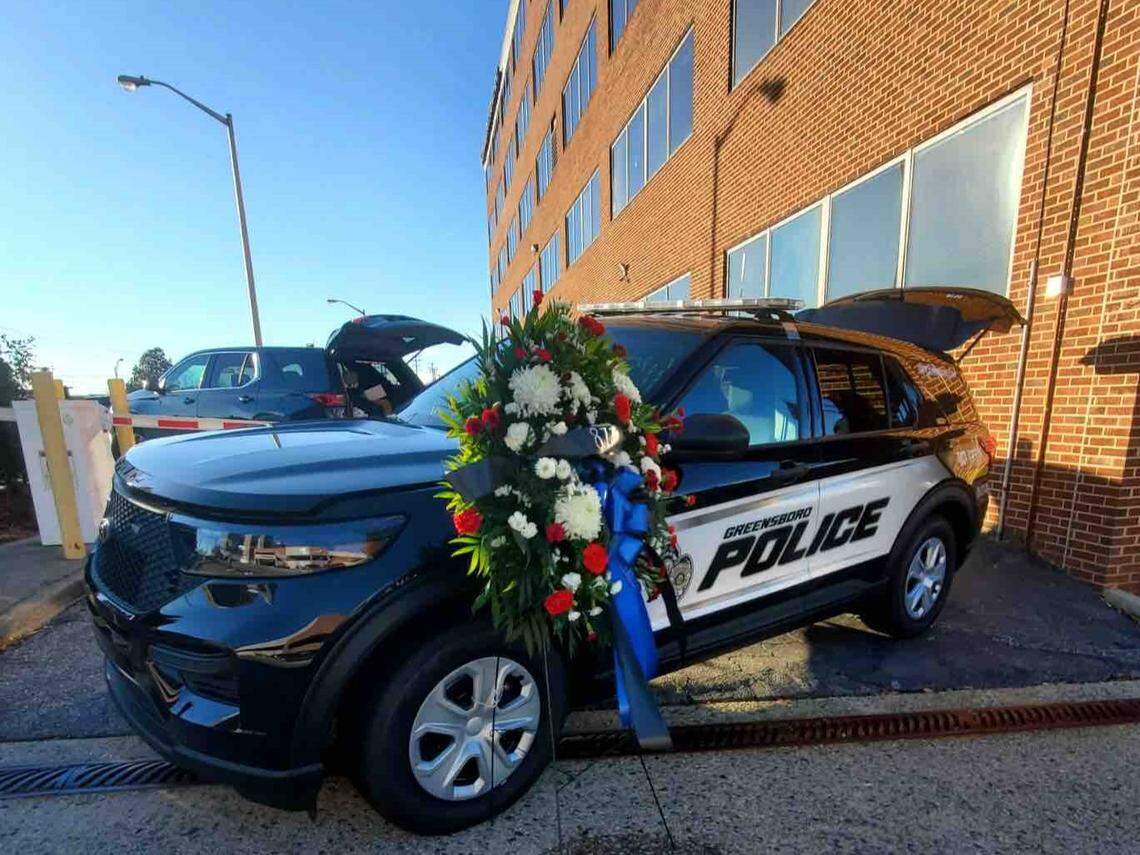 A memorial has been set up at the Greensboro Police Department headquarters for Sgt. Philip Dale Nix, who was killed while he was off-duty Dec. 30, 2023. He served with the department for 23 years.