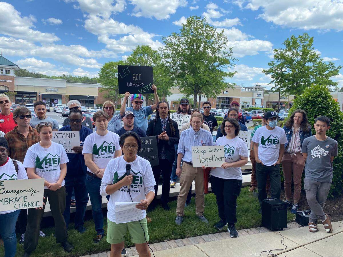 REI workers, UFCW organizers, and supporters rallied outside the REI store in Durham, North Carolina on May 2, 2023.
