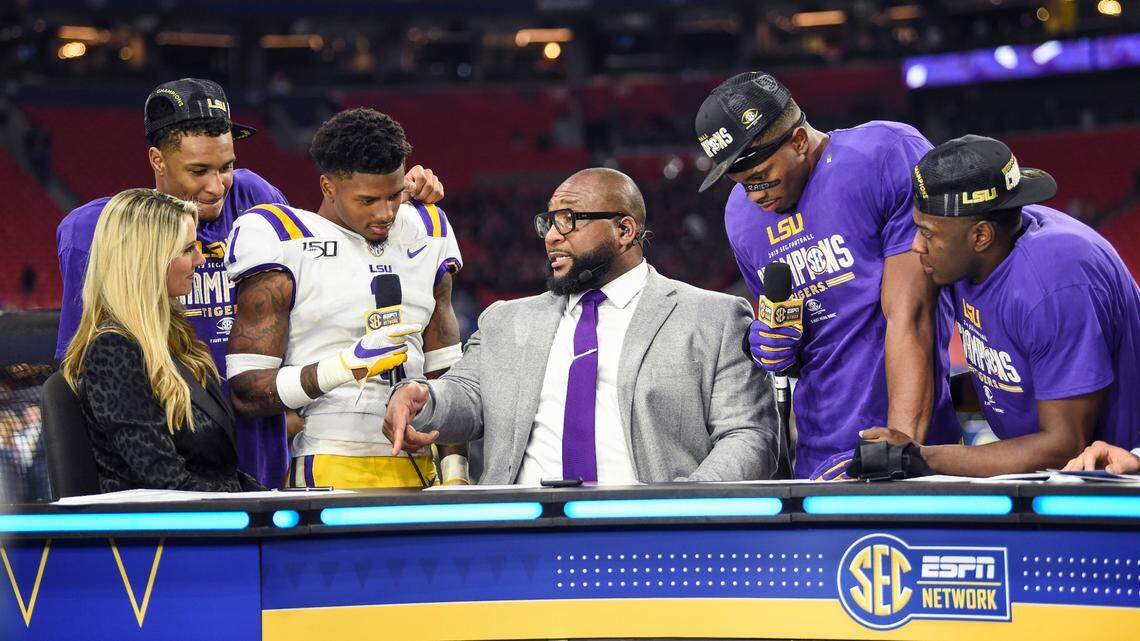 LSU players are interviewed on the set of ESPN SEC Network after defeating the Georgia Bulldogs in the 2019 SEC Championship Game at Mercedes-Benz Stadium.