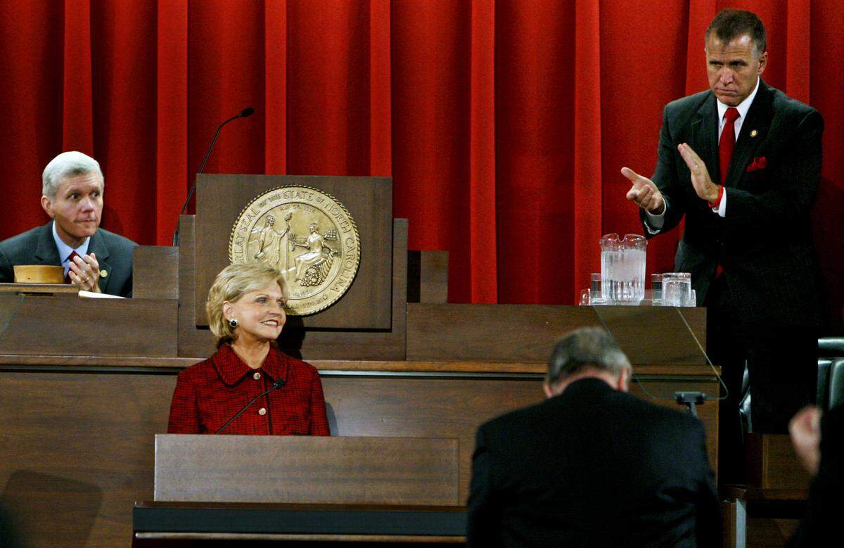 Gov. Bev Perdue’s call for reduced corporate taxes for the state elicited not only a standing ovation but applause from Speaker Thom Tillis, right, during her State of the State address at the Legislative Building in February 2011.