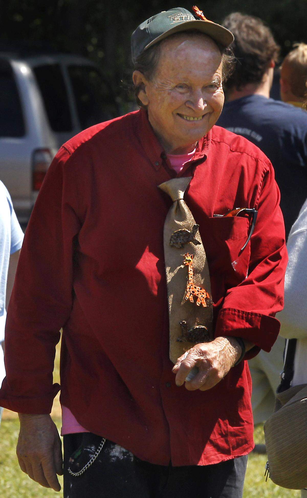 Local folk artist, Clyde Jones smiles as he walks among the attendees of the 11th Annual ClydeFEST in 2012.