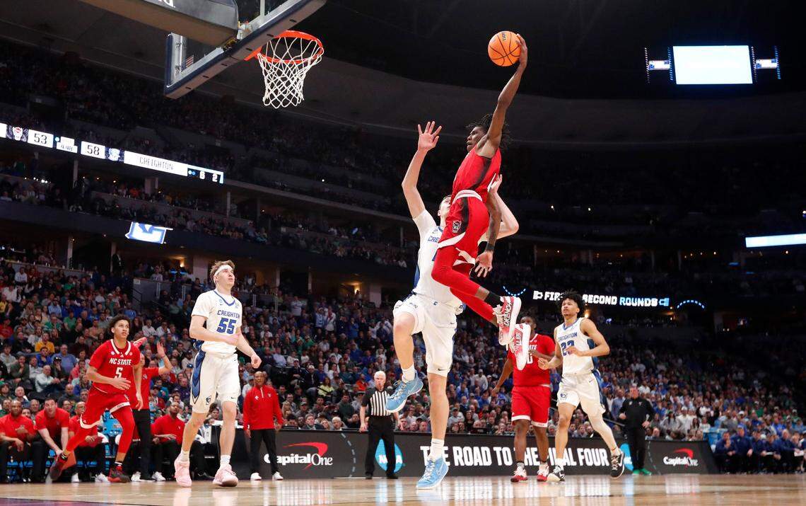 N.C. State’s Terquavion Smith (0) heads in to slam in two during Creighton’s 72-63 victory over N.C. State in the first round of the NCAA Tournament at Ball Arena in Denver, Colo., Friday, March 17, 2023.