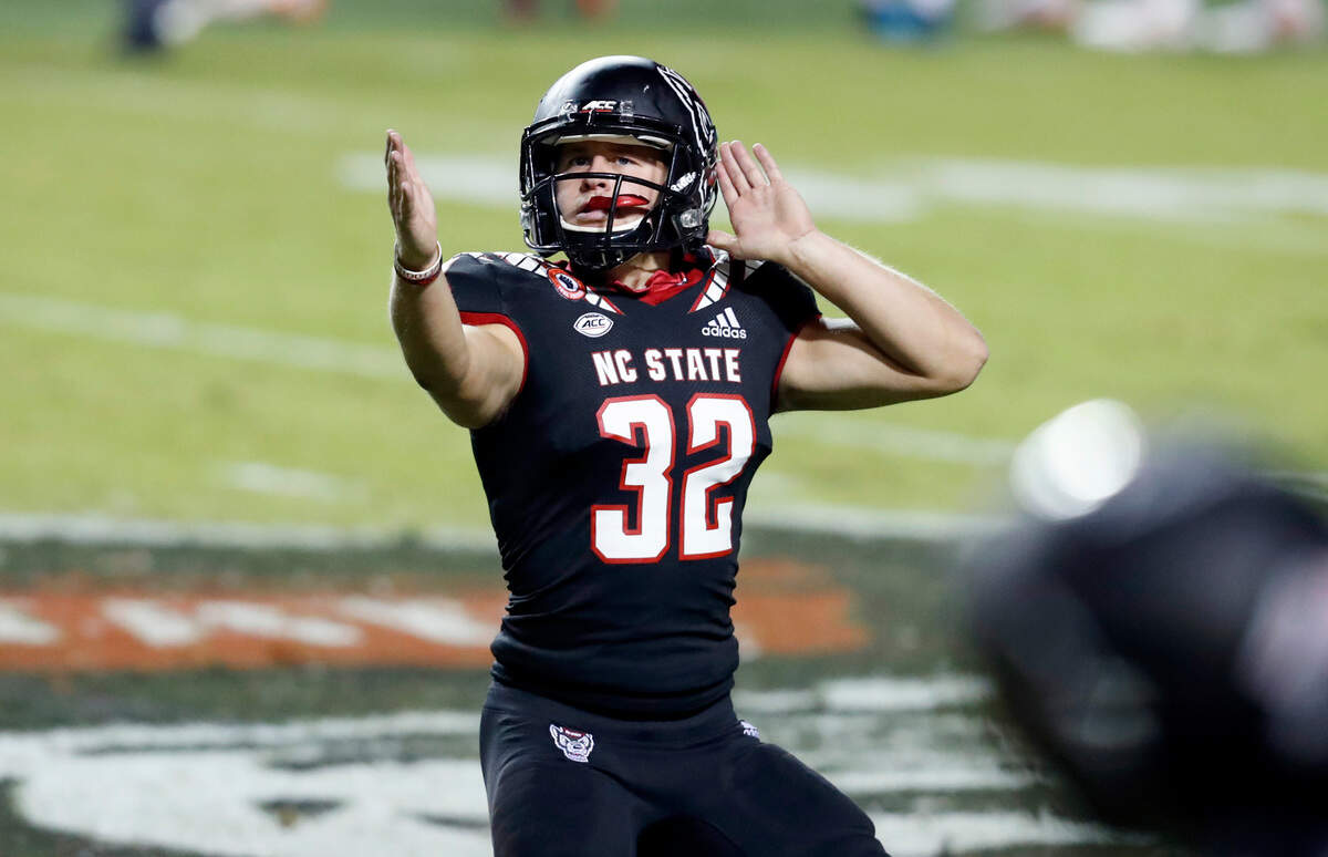 N.C. State’s Christopher Dunn (32) celebrates making a 53-yard field goal during the second half of Miami’s 44-41 victory over N.C. State at Carter-Finley Stadium in Raleigh, N.C., Friday, Nov. 6, 2020.