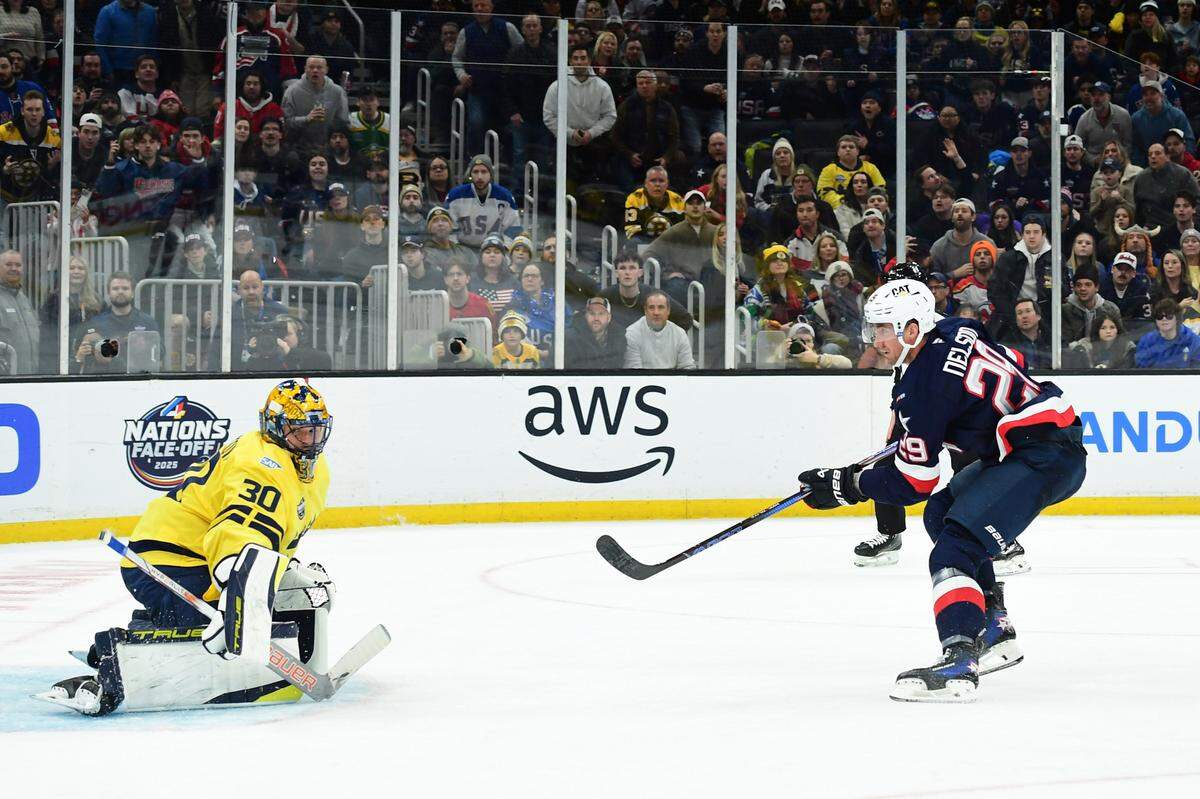 Team USA forward Brock Nelson (29) shoots the puck wide of Team Sweden goalie Samuel Ersson (30) during the third period in a 4 Nations Face-Off game at TD Garden.