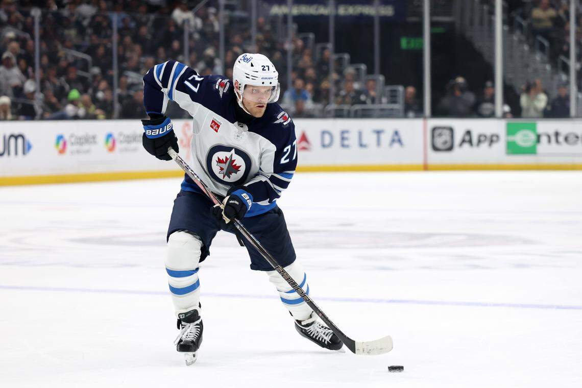 Apr 1, 2025; Los Angeles, California, USA;  Winnipeg Jets left wing Nikolaj Ehlers (27) skates with the puck during the third period against the Los Angeles Kings at Crypto.com Arena. 