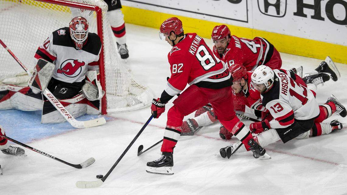 The Carolina Hurricanes Jesperi Kotkaniemi (82) lines up to score the second of his goals on New Jersey Devils goalie Akira Schmid (40) in the second period during Game 2 of their second round Stanley Cup playoff series on Friday, May 5, 2023 at PNC Arena in Raleigh, N.C.