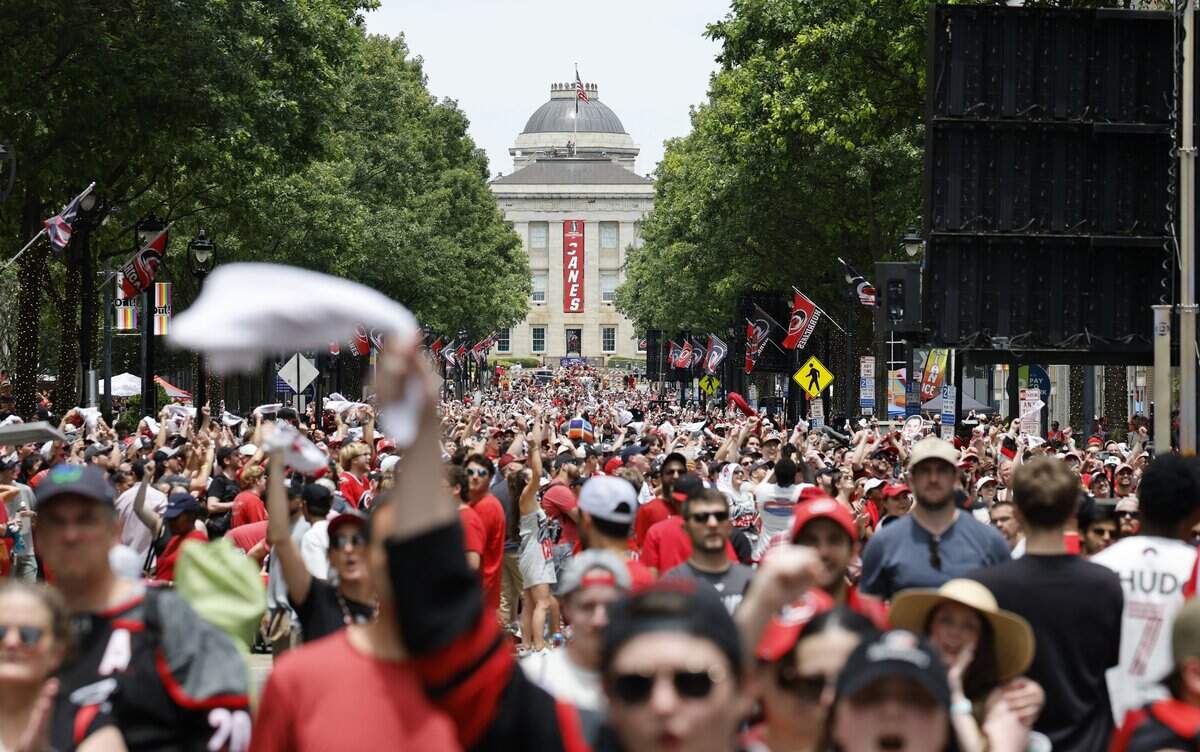 Fans fill Fayetteville St. in downtown Raleigh cheer on the Canes during a rally for the Carolina Hurricanes Saturday, June 20, 2026.