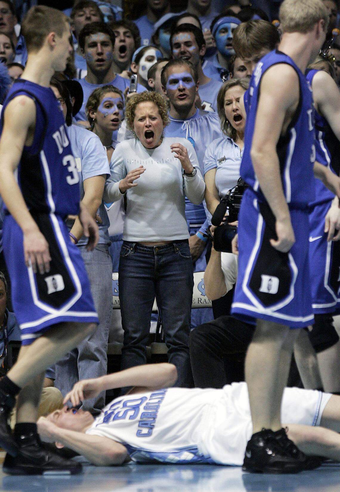 UNC fans react after a flagrant foul by Duke’s Gerald Henderson (not pictured) knocked down UNC’s Tyler Hansbrough late during the second half at the Smith Center on Sunday, March 4, 2007. Duke’s Gerald Henderson was ejected from the game. UNC won 86-72.