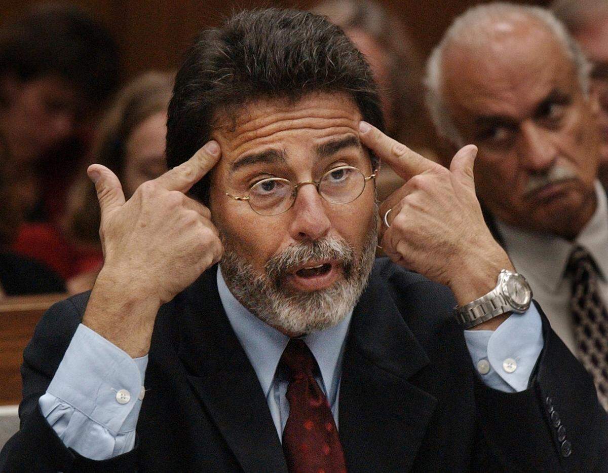 Defense attorney David Rudolf asks Durham Police ID technician Dan George why he didn’t think he needed to takes notes as he was collecting evidence in the Michael Peterson home in December 2001 when Kathleen Peterson was killed.