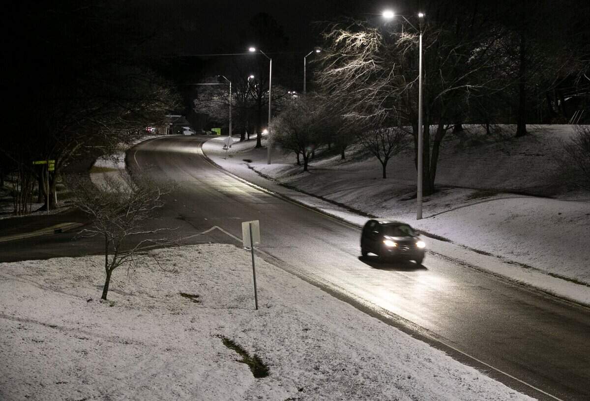 A light dusting of snow blankets the grassy services along Western Blvd near the N.C. State campus after a winter storm moved through the Triangle in the early morning hours of Thursday, January 28, 2021in Raleigh, N.C. Most roads are slushy and traffic is moving freely.