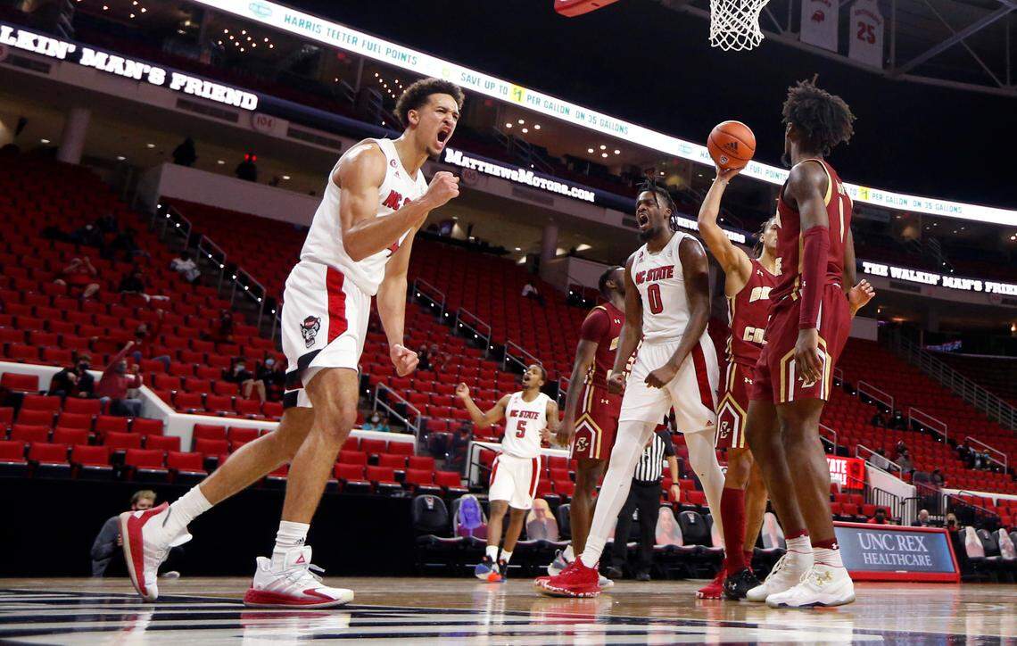 N.C. State’s Jericole Hellems (4) celebrates after making the basket while being fouled in the second half during N.C. State’s 79-76 victory over Boston College at PNC Arena in Raleigh, N.C., Wednesday, December 30, 2020.