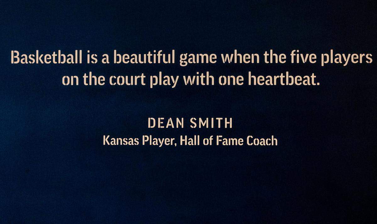 A illuminated quote by Dean Smith, in the walkway to Allen Fieldhouse on Thursday, November 7, 2024 in Lawrence, Kansas.