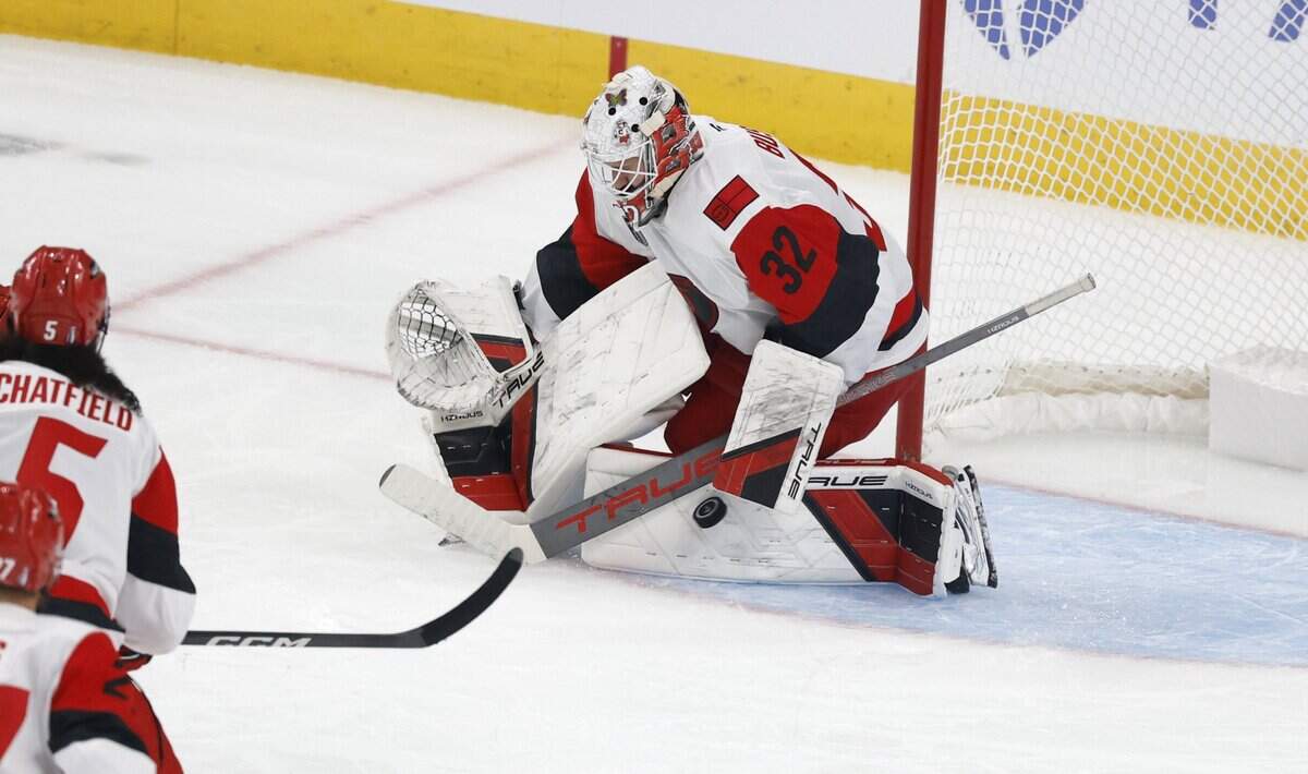 Carolina's Brandon Bussi (32) makes the save during the first period of the Hurricanes’ game against the Golden Knights in Game 6 of the Stanley Cup Final at T-Mobile Arena in Las Vegas, Nev., Sunday, June 14, 2026.