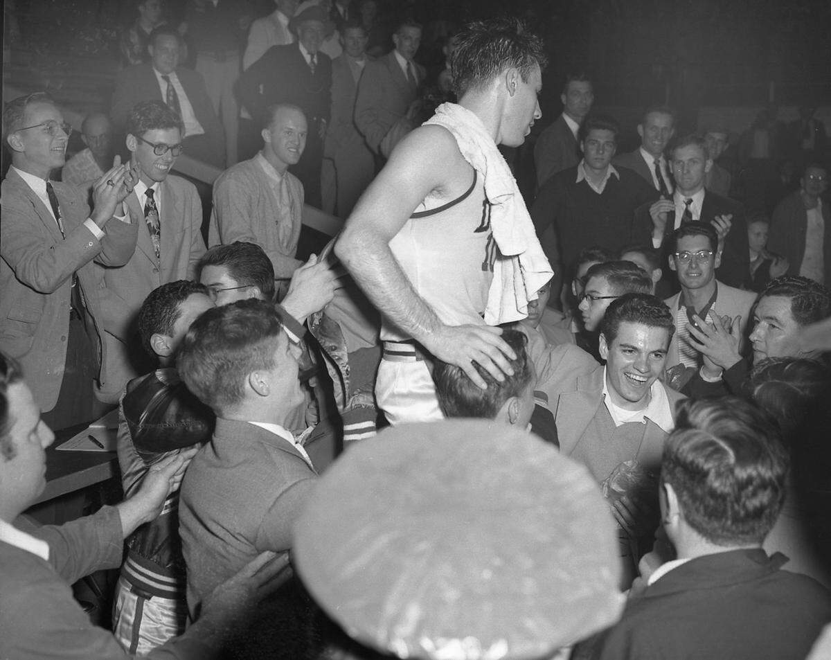 Dick Groat receives congratulations after breaking Duke’s scoring record, by scoring 48 points against Carolina, on February 29, 1952.