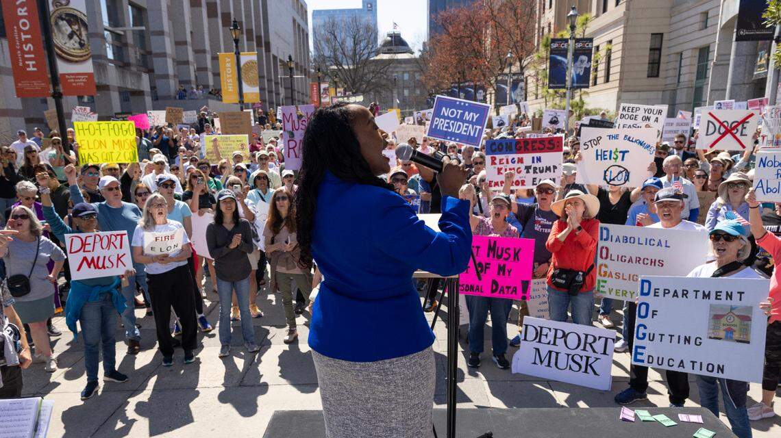 State Sen. Natalie Murdock speaks to protesters opposed to cuts and actions by DOGE and Elon Musk rally on Bicentennial Plaza near the NC Legislative Building on Wednesday, March 12, 2025.