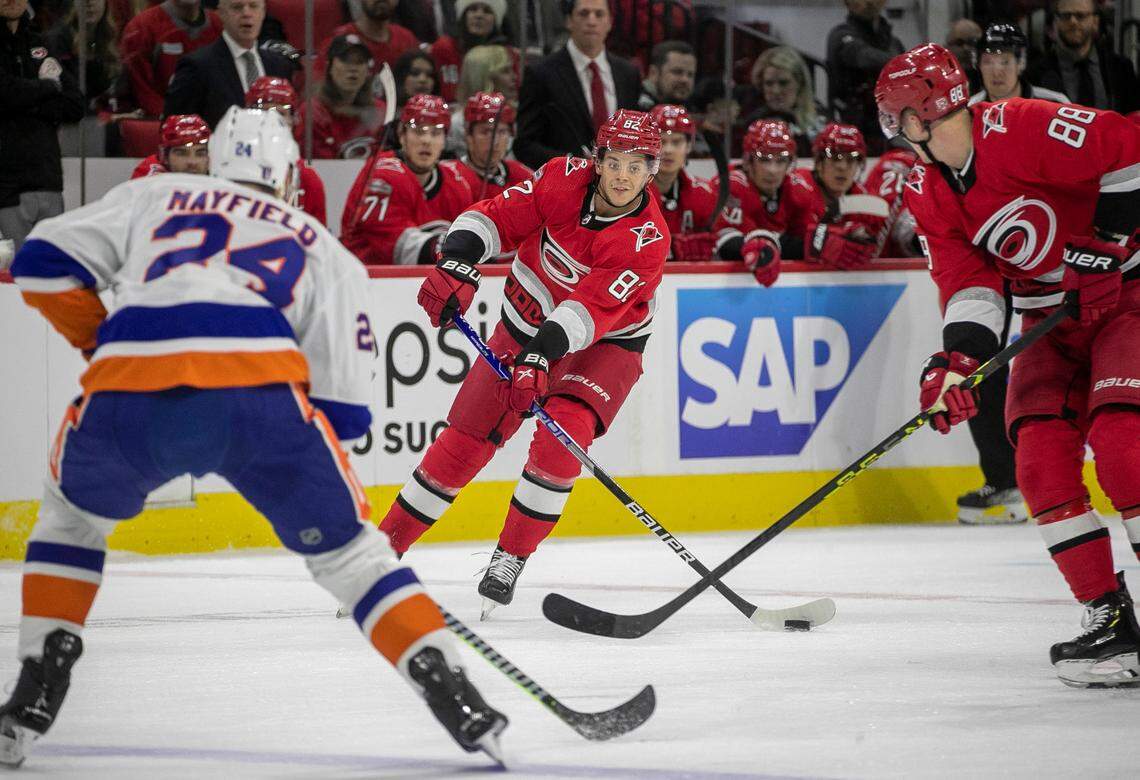 Carolina Hurricanes Jesperi Kotkaniemi (82) passes to Martin Necas (88) in the first period against the New York Islanders on Monday, April 17, 2023 at PNC Arena in Raleigh, N.C.