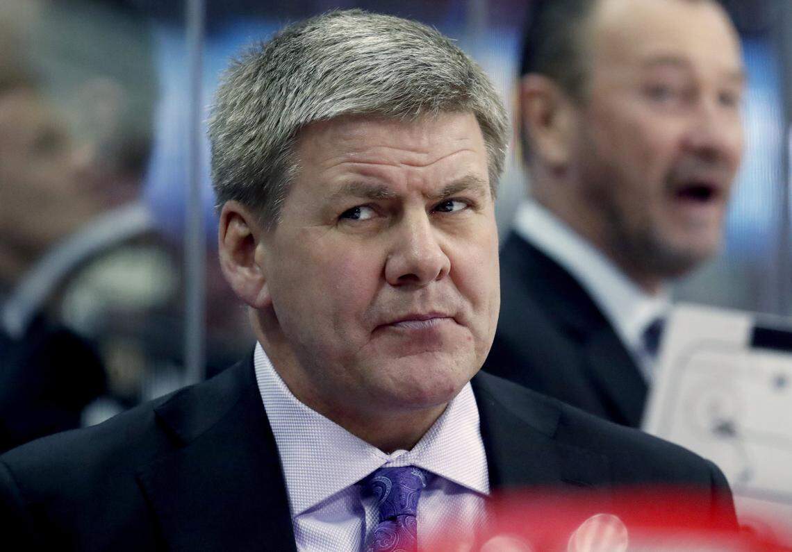 The Canes' head coach Bill Peters watches the action during an NHL game played between the Carolina Hurricanes and the Detroit Red Wings at PNC Arena in Raleigh, N.C. on Feb. 2,  2018.   