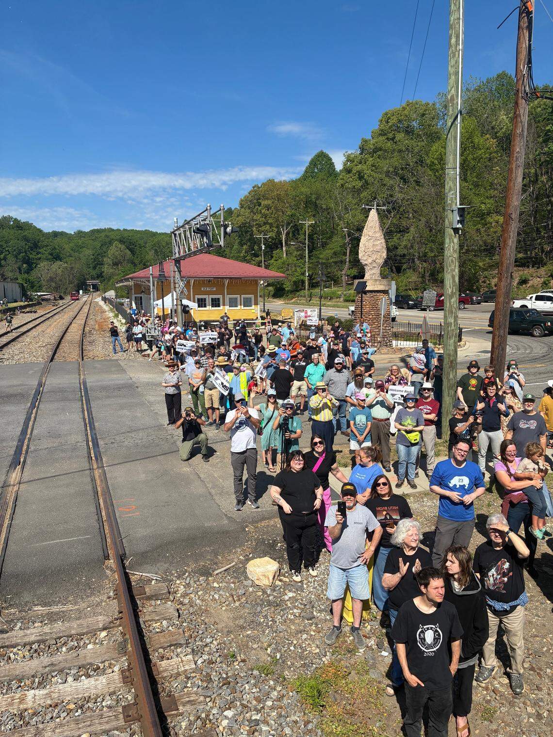 Residents and rail fans from throughout the region gathered in Old Fort on Saturday, April 18, to welcome the first Norfolk Southern freight train to pass through town since Hurricane Helene in September 2024.