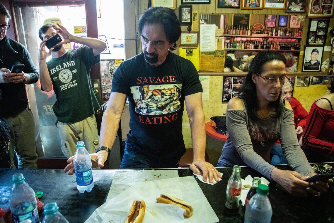 Gregory Scott Wilson forced down 27 fully loaded chili dogs in 51 minutes Wednesday, breaking the record at The Roast Grill in Raleigh.