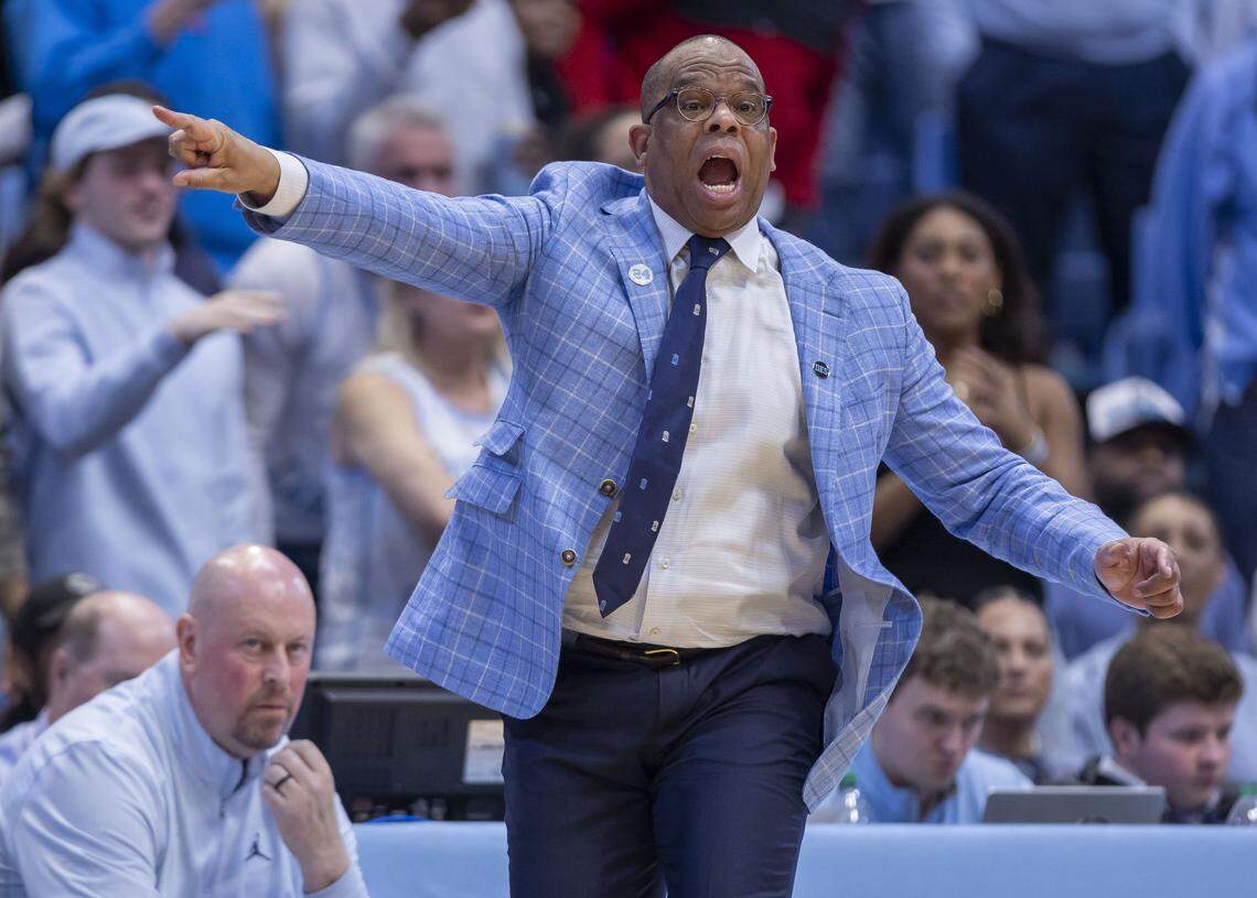North Carolina coach Hubert Davis directs his players on offense late in a close game against Clemson on Tuesday, March 3, 2026 at the Smith Center in Chapel Hill, N.C.