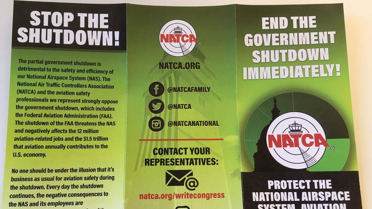 Air traffic controllers handed out these leaflets to passengers at Raleigh-Durham International Airport last week. The National Air Traffic Controllers Association has expanded the campaign to more than 50 airports nationwide.
