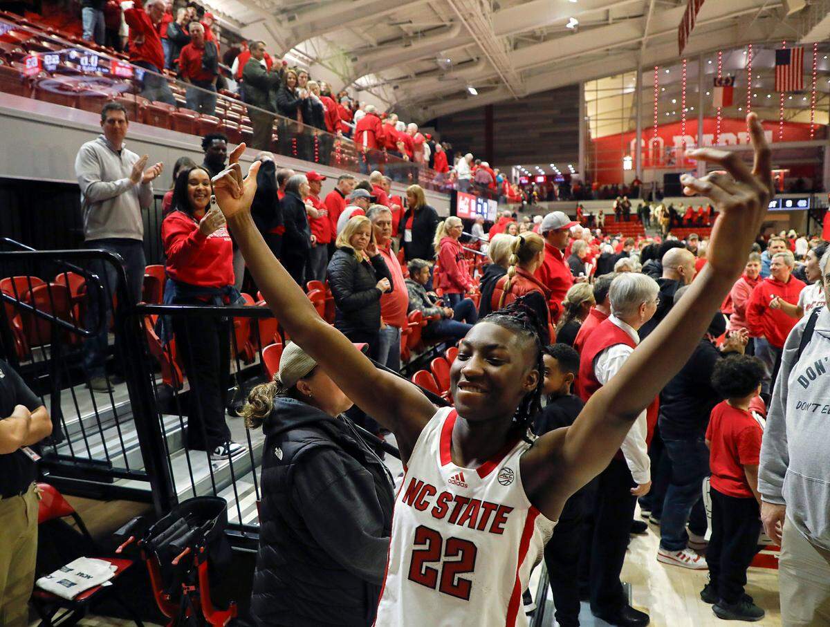 N.C. State’s Saniya Rivers celebrates while walking off the court after the Wolfpack’s 63-59 win over North Carolina on Thursday, Feb. 1, 2024, at Reynolds Coliseum in Raleigh, N.C.