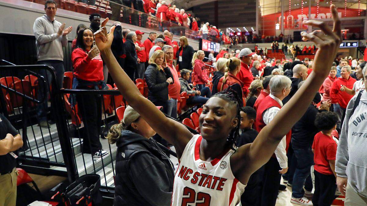 N.C. State’s Saniya Rivers celebrates while walking off the court after the Wolfpack’s 63-59 win over North Carolina on Thursday, Feb. 1, 2024, at Reynolds Coliseum in Raleigh, N.C.