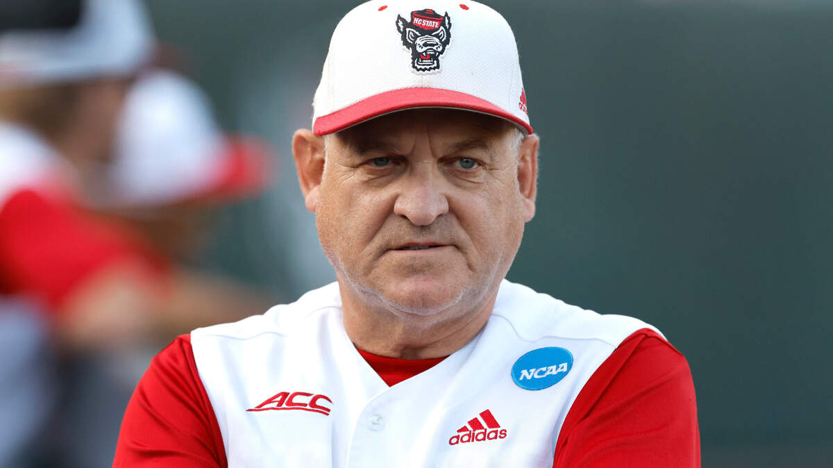 N.C. State head coach Elliott Avent walks outside the dugout between innings during N.C. State’s game against Bryant in the NCAA Raleigh Regional at Doak Field Friday, May 31, 2024.