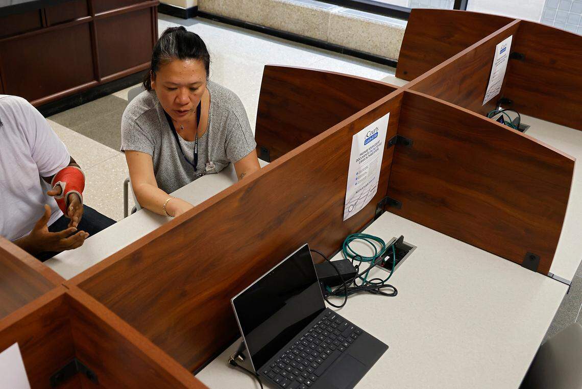 Anh LyJordan works with a client at the Wake County Legal Support Center on Tuesday, May 16, 2023, in Raleigh, N.C.