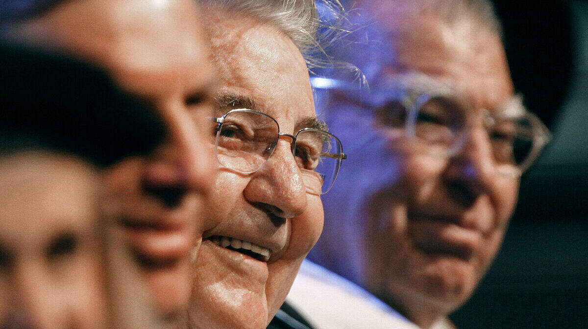 Bill Friday, second from right, smiles during ceremonies for the inauguration of Tom Ross at N.C. A&T State University in Greensboro on October 6, 2011.  Former UNC president C.D. Spangler is at far right, and Ross is at left.