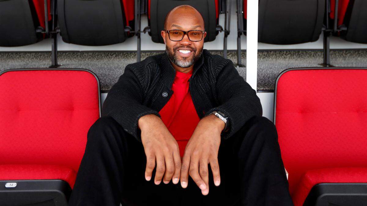 Torry Holt, a receiver for the N.C. State football team from 1995-98, poses at Carter-Finley Stadium in Raleigh, N.C., Monday, Jan 7, 2019. Holt was named on Monday to the 2019 College Football Hall of Fame class.