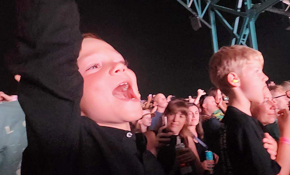 From left, Jake Harriss and Bradley Geisen, both 8, watching Imagine Dragons at their first concert on Monday, August, 26, 2024 in Virginia Beach.