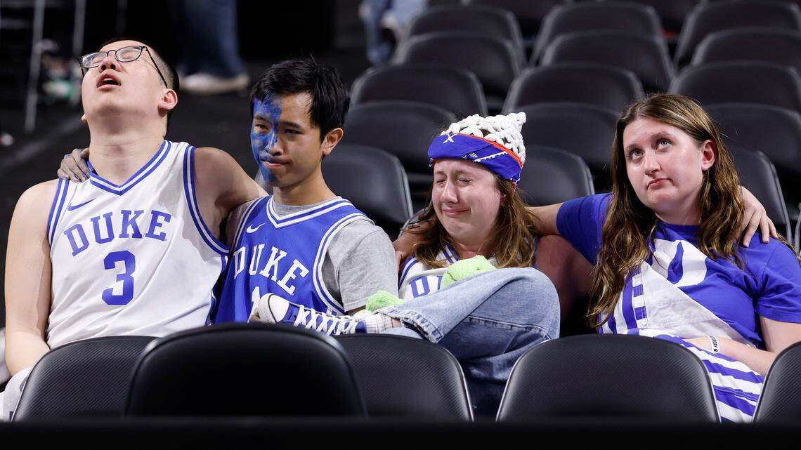 Duke fans sit after Houston’s 70-67 victory over Duke in the NCAA men’s national semifinal at the Alamodome in San Antonio, Texas, Saturday, April 5, 2025.
