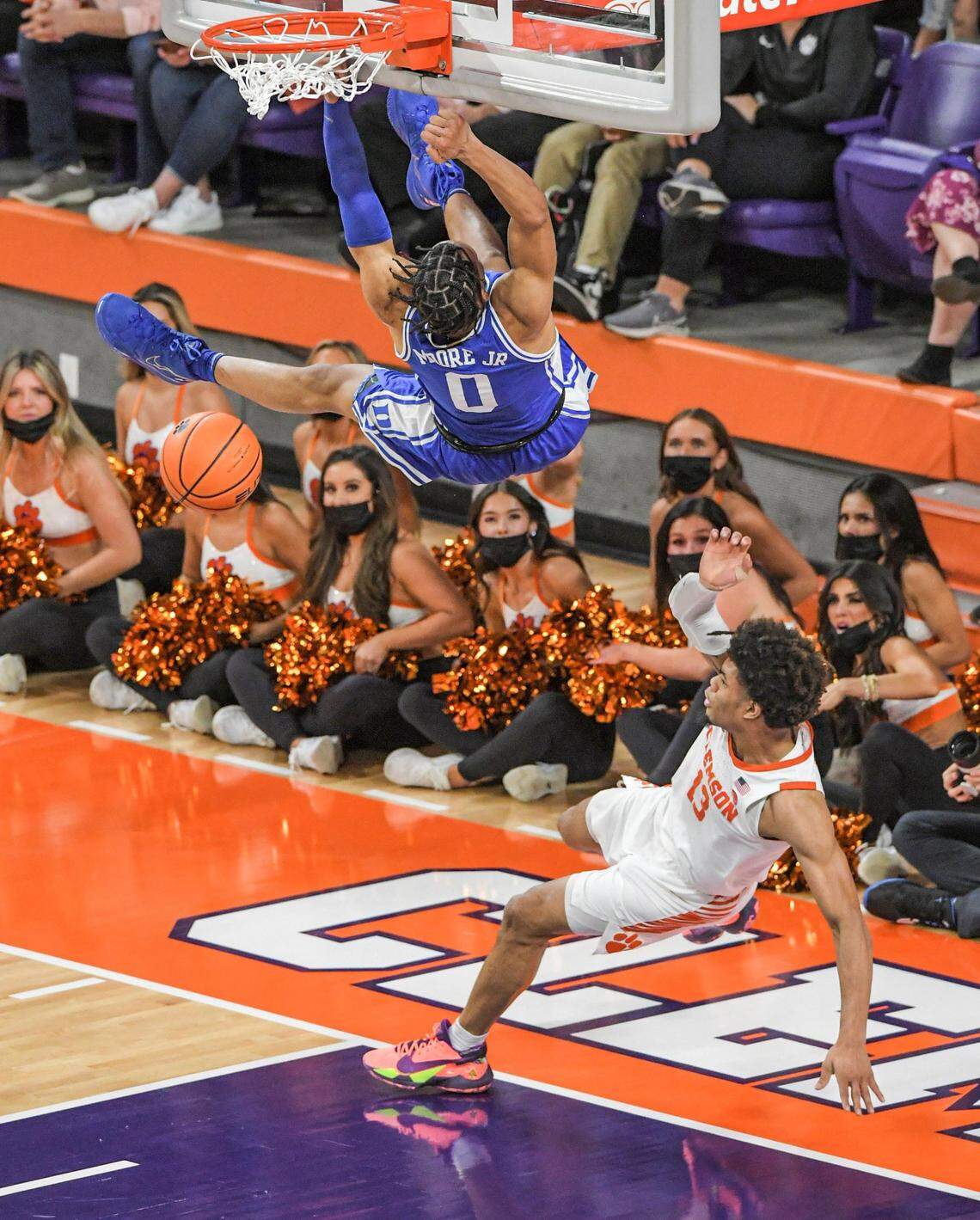 Clemson guard David Collins (13) fouls Duke forward Wendell Moore Jr (0) during the first half of an NCAA college basketball game in Clemson, S.C., Thursday, Feb. 10, 2022. Collins was ejected. Duke beat Clemson 82-64. (Ken Ruinard/The Independent-Mail via AP)