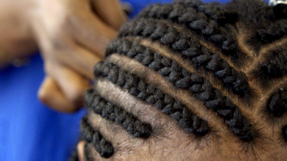 Senate Bill 808 aims to separate hair braiding from cosmetology licensure, easing entry with a 10-hour infection control course and an exam, sparking debate.