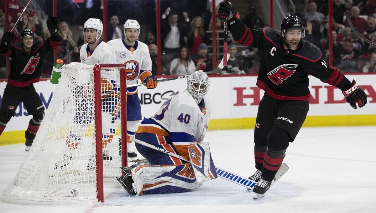 Carolina Hurricanes’ Justin Williams (14) scores the game winning goal on New York Islander goalie Robin Lehner (40) during the third period of Game 3 of their second round Stanley Cup series on Wednesday, May 1, 2019 at PNC Arena in Raleigh, N.C.